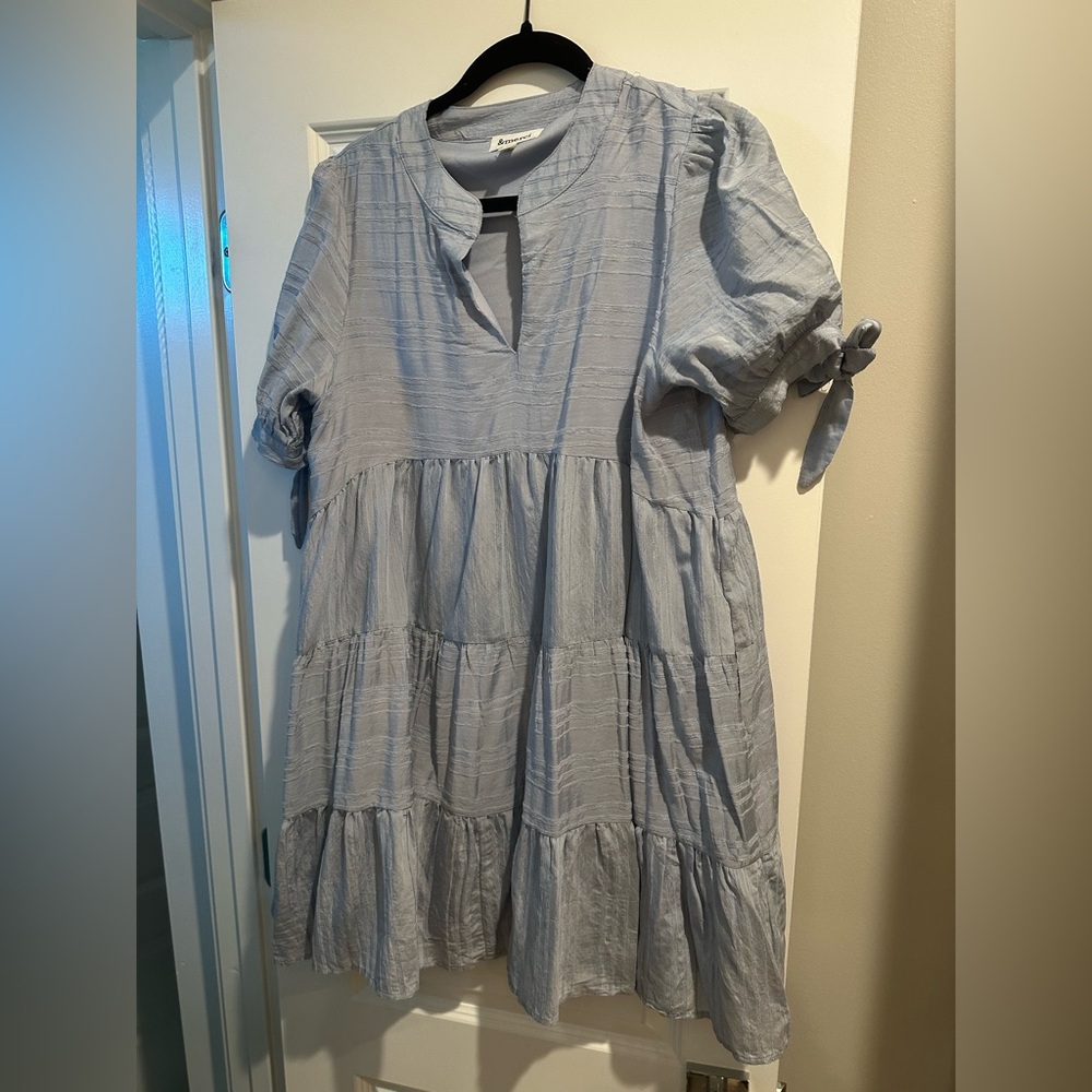&merci blue dress. Bow tie sleeves. Size medium.